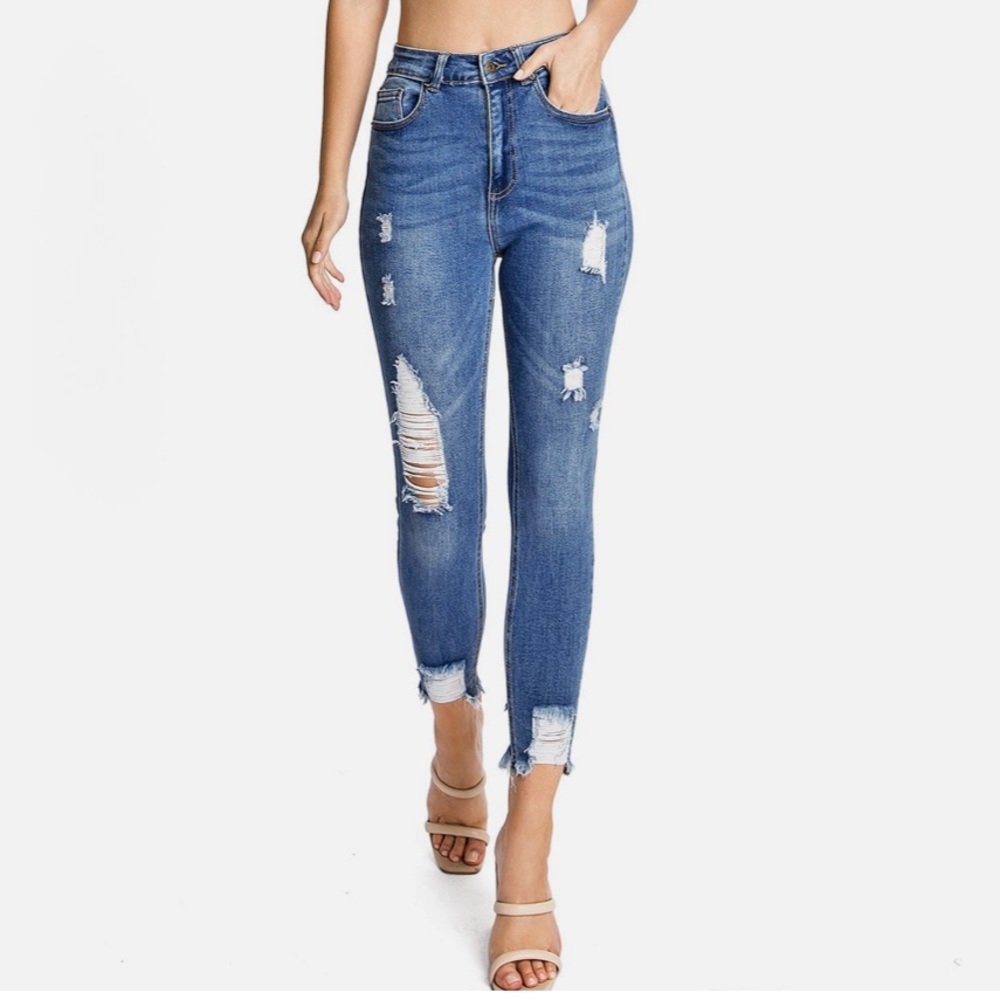 Skinny fit high rise distressed jeans